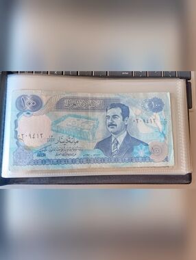 This 1994, 100 Dinars Note from the Central Bank of Iraq is in good condition.